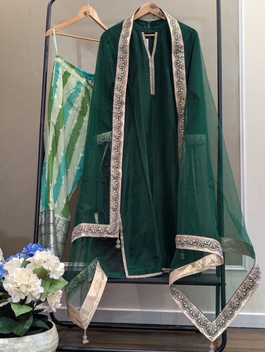 Green silk kurta set with net dupatta
